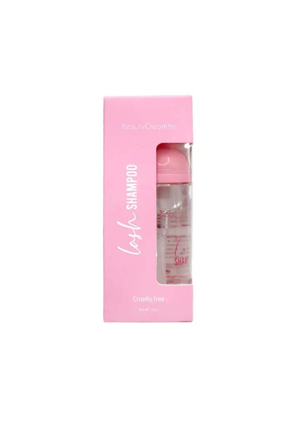 Una botella transparente de "Lash Shampoo" de Beauty Creations en una caja rosa que dice cruelty-free, mostrada sobre un fondo blanco.