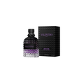 Frasco facetado del perfume Valentino Uomo, acompañado de una caja negra con textura y detalles en color púrpura. Ambos se presentan sobre un fondo blanco que resalta sus formas geométricas y acabados, transmitiendo una imagen moderna, lujosa y de gran carácter.