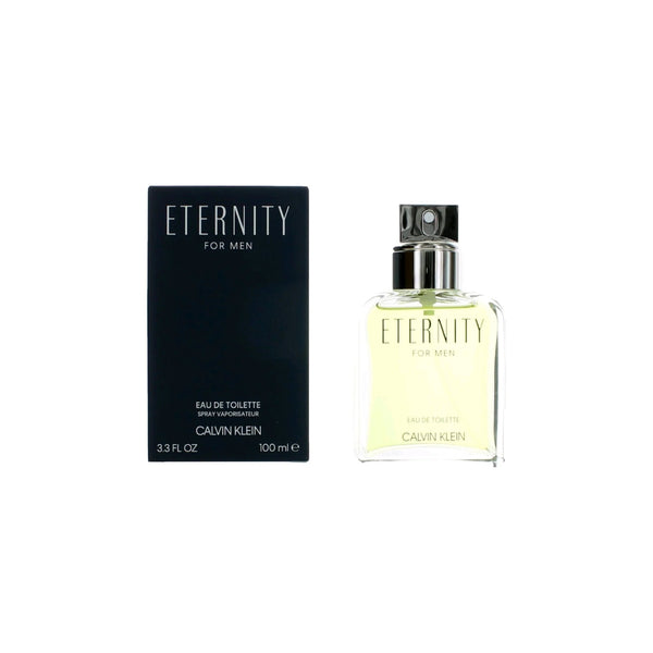 Botella de perfume de vidrio transparente "Eternity for Men" de Calvin Klein de 100 ml con líquido pálido verdoso y atomizador metálico plateado, junto a su caja negra mate con tipografía minimalista en blanco.