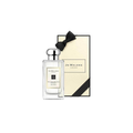 Botella de colonia Nectarine Blossom & Honey de Jo Malone con una tapa plateada pulida, frente a una caja de regalo color crema adornada con un lazo negro, que transmite elegancia y lujo.