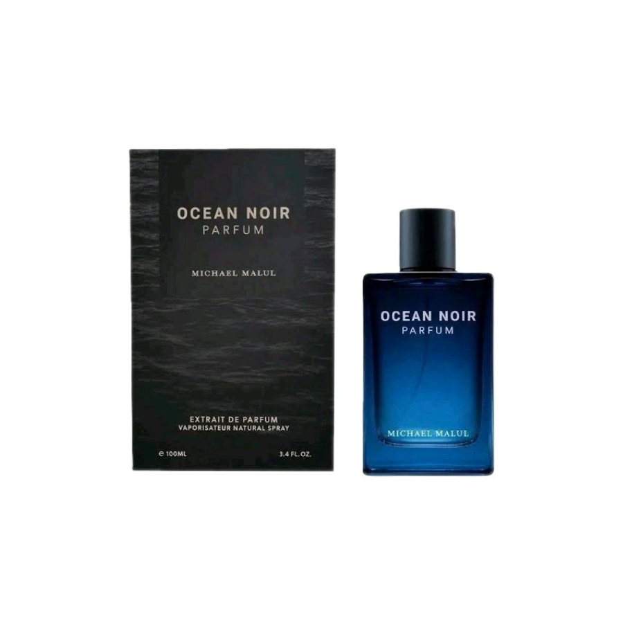Ocean Noir Parfum de Michael Malul: una botella de fragancia de vidrio azul intenso junto a su caja negra, con letras blancas destacadas, que transmite una sensación elegante, moderna y lujosa.