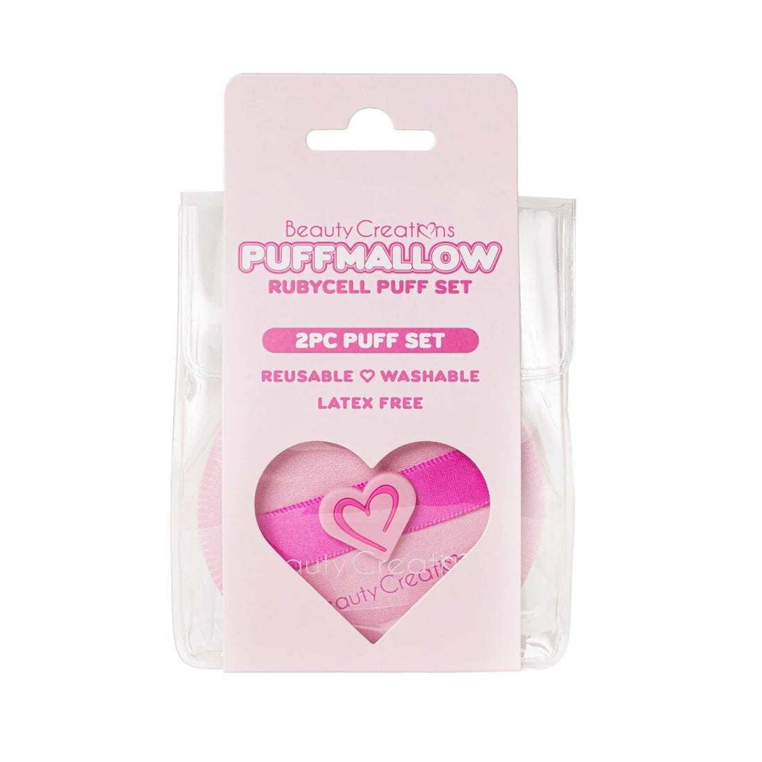 Set de esponjas "Puffmallow" Rubycell en rosa, presentado en un empaque transparente con dos esponjas de maquillaje reutilizables con forma de corazón; diseño de producto de belleza suave.